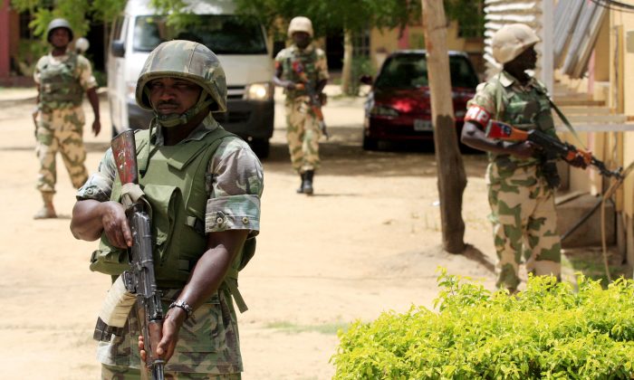 Nigerian soldiers in a file photo. (AP Photo/Jon Gambrell)