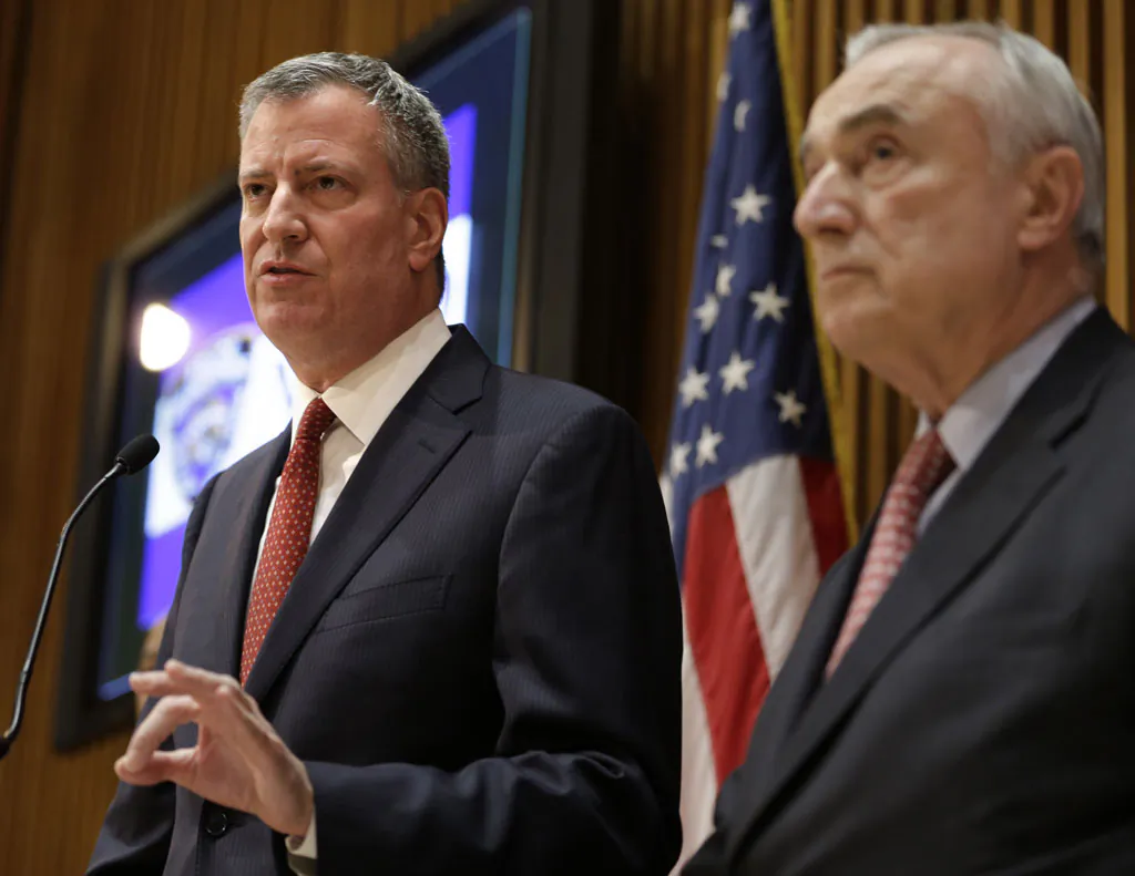 New York City Mayor Bill de Blasio (L) and Police Commissioner Bill Bratton during a news conference at police headquarters in Manhattan, N.Y., on Monday, Dec. 22, 2014. Bratton and de Blasio asked that protesters put on hold their demonstrations against police brutality. (AP Photo/Seth Wenig)