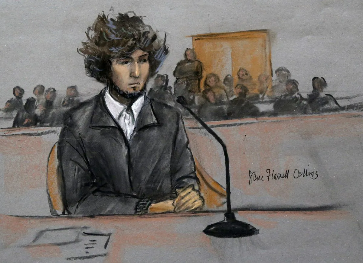 In this courtroom sketch, Boston Marathon bombing suspect Dzhokhar Tsarnaev is depicted sitting in federal court in Boston Thursday, Dec. 18, 2014, for a final hearing before his trial begins in January. Tsarnaev is charged with the April 2013 attack that killed three people and injured more than 260. He could face the death penalty if convicted.  (AP Photo/Jane Flavell Collins)