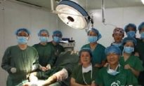 Chinese Doctors Pose for Pictures During Surgery