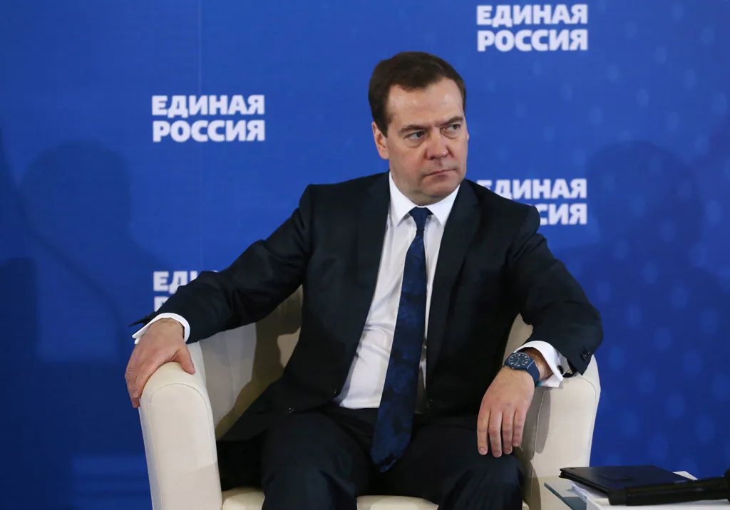 Russian Prime Minister Dmitry Medvedev listens during a meeting with senior ruling United Russia Party officials in Moscow, Russia on Tuesday, Dec. 23, 2014. Medvedev has warned that the country faces a risk of a "deep recession" if the government ditches its spending plans. Speaking at a meeting of his party, Medvedev said Tuesday that the government won't retreat from its strategic aims and social spending. Otherwise, he said Russia could plunge into a "deep recession." He also said the Russian economy is in a worse place now than in the 2008 crisis because "a number of countries are effectively hampering the development of our economy." (AP Photo/RIA Novosti, Yekaterina Shtukina, Government Press service)