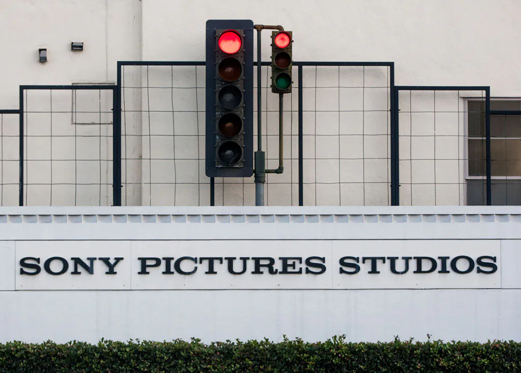 An exterior view of the Sony Pictures Studios building is seen in Culver City, Calif., on Dec. 19, 2014. It seems everyone has a theory about who really hacked Sony Pictures Entertainment Inc. Despite President Barack Obama’s conclusion that North Korea was the culprit, the Internet’s newest game of whodunit continues. Top theories include disgruntled Sony insiders, hired hackers, other foreign governments or Internet hooligans. Even some experts are undecided, with questions about why the communist state would steal and leak gigabytes of data, email threats to some Sony employees and their families then threaten moviegoers who planned to watch “The Interview” on Christmas. (AP Photo/Damian Dovarganes)