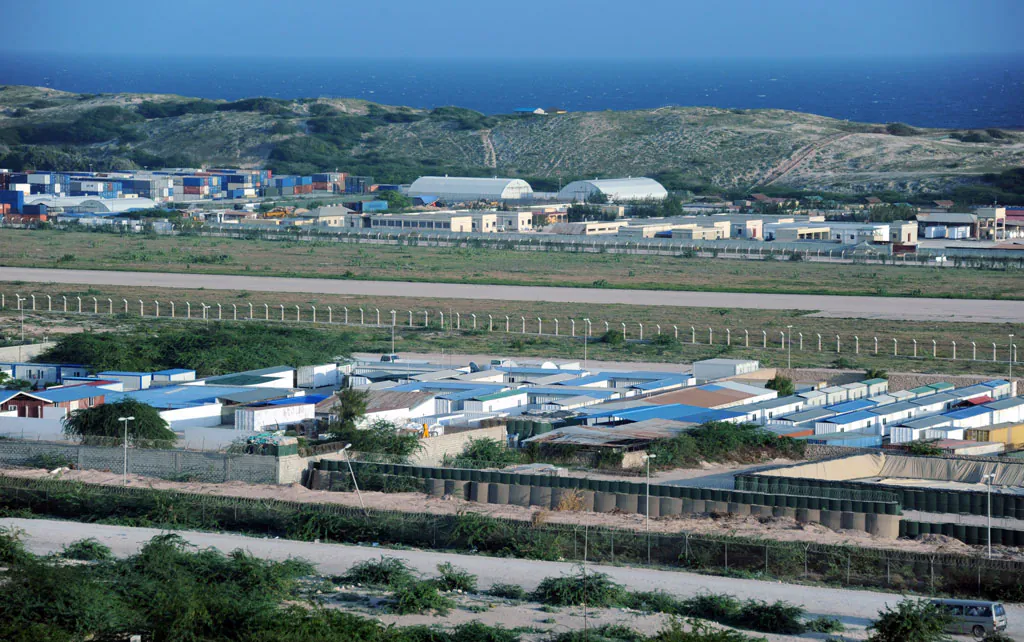 The African Union Mission in Somalia (AMISOM) headquarters, located within the high-security compound of Mogadishu airport, on Dec. 25, 2014. Three African Union soldiers and a civilian were killed on Dec. 25 after Shebab militants attacked the force's heavily fortified headquarters in Somalia. The AU force known as AMISOM said troops regained control of the base in Mogadishu after a gunfight that left five of the attackers dead while three others were captured. (Mohamed Abdiwahab/AFP/Getty Images)