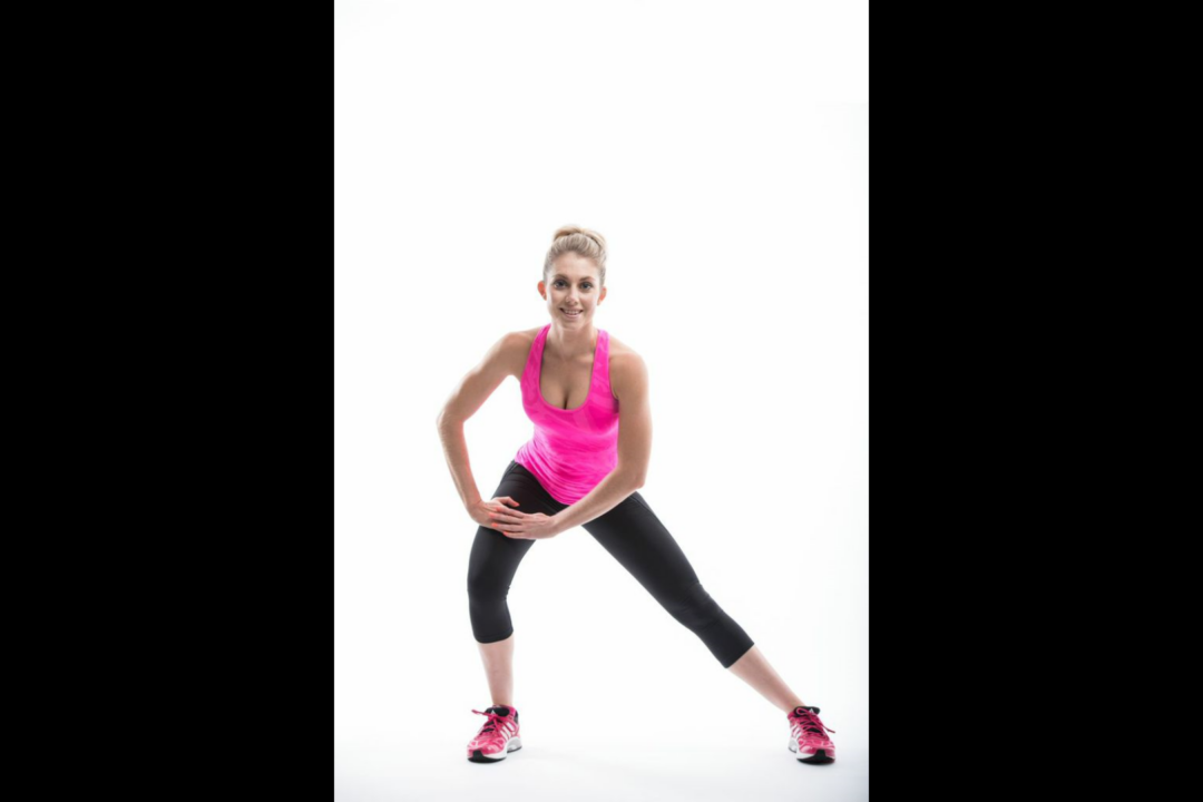 Stretching is a great way to relax. Spend 5 to 10 minutes stretching to relax your body and declutter your mind at the end of the day. (Willis Lim) Model: Alana Ford