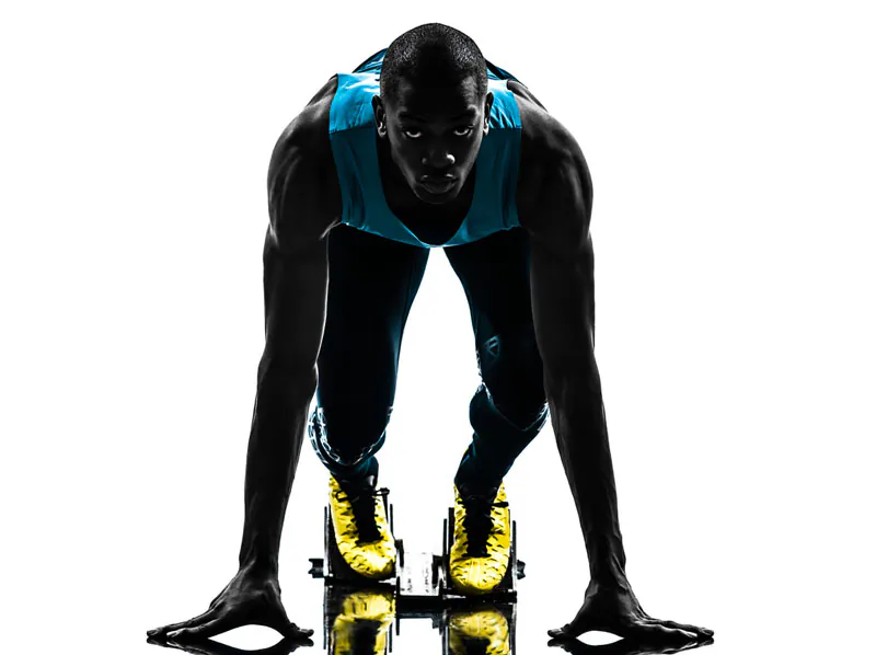 "If you watch someone running a 100-meter race, you can see his or her knees continually churning up and down, propelling the sprinter forward. Symmetry is very efficient," says Robert Trivers. (Shutterstock*)