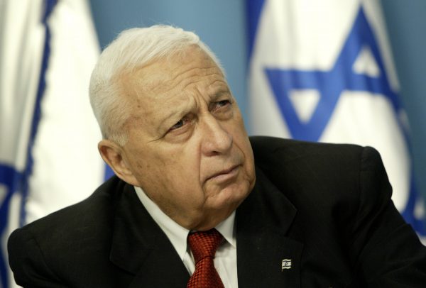 Israeli Prime Minister Ariel Sharon pauses during a news conference in his Jerusalem office regarding education reform on May 16, 2004. Sharon, the hard-charging Israeli general and prime minister who was admired and hated for his battlefield exploits and ambitions to reshape the Middle East, died Saturday, Jan. 11, 2014. The 85-year-old Sharon had been in a coma since a debilitating stroke eight years ago. (AP Photo/Oded Balilty)