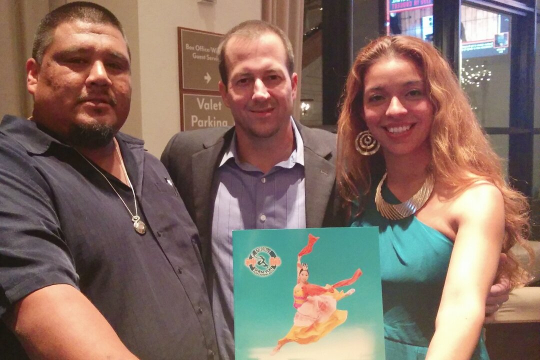 Gabriel Osceola (L), Glenn Prieto, and Jennifer Prieto at the Shen Yun Performing Arts performance at the Broward Center for the Performing Arts in Fort Lauderdale on Dec. 26, 2014. (Jada Yeung/Epoch Times)