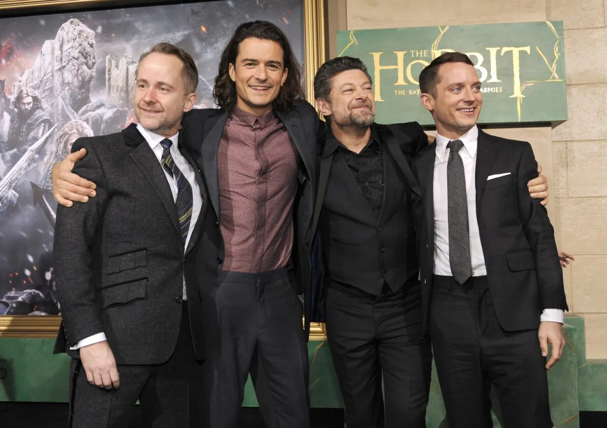 (L-R) Billy Boyd, Orlando Bloom, Andy Serkis and Elijah Wood arrive at the Los Angeles premiere of "The Hobbit: The Battle Of The Five Armies" at the Dolby Theatre on Tuesday, Dec. 9, 2014. (Chris Pizzello/Invision/AP)