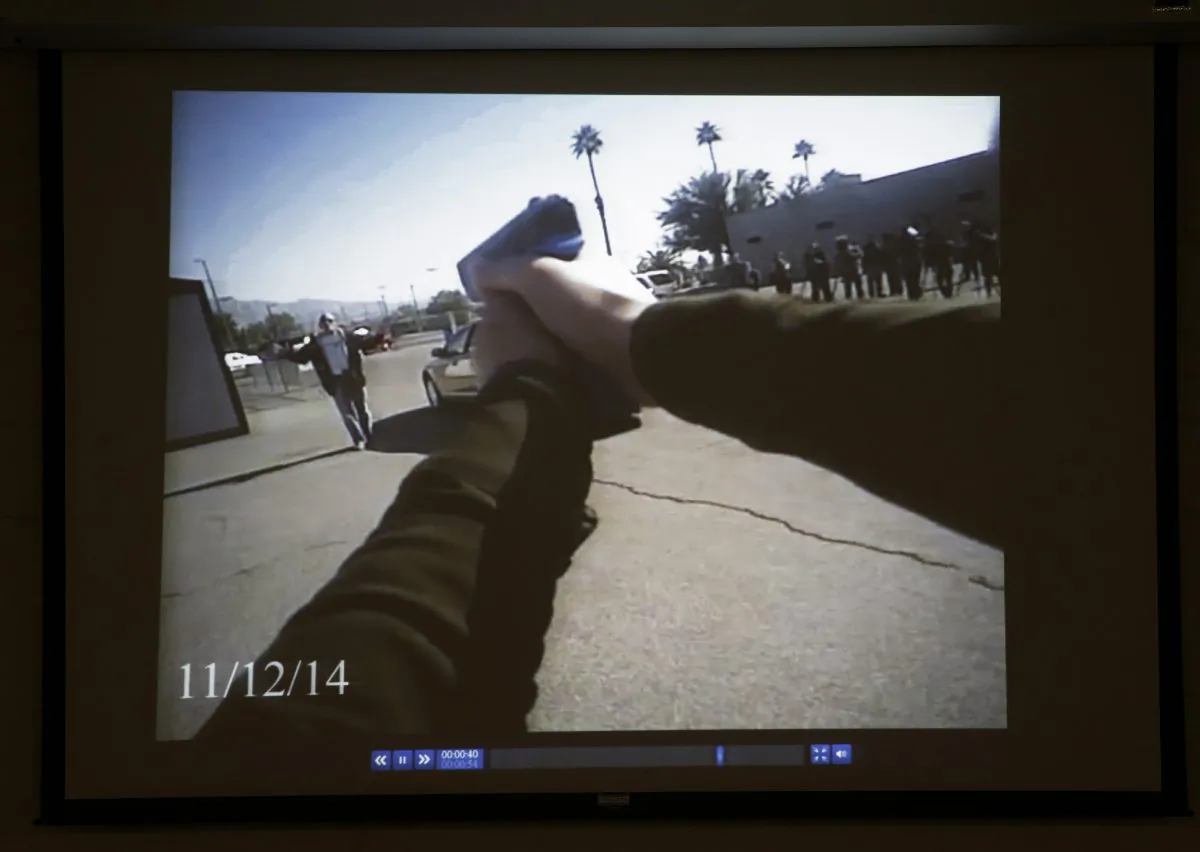 Footage from a Las Vegas police department body camera demonstration is projected on a screen in this Nov. 12, 2014 file photo. (AP Photo/John Locher)