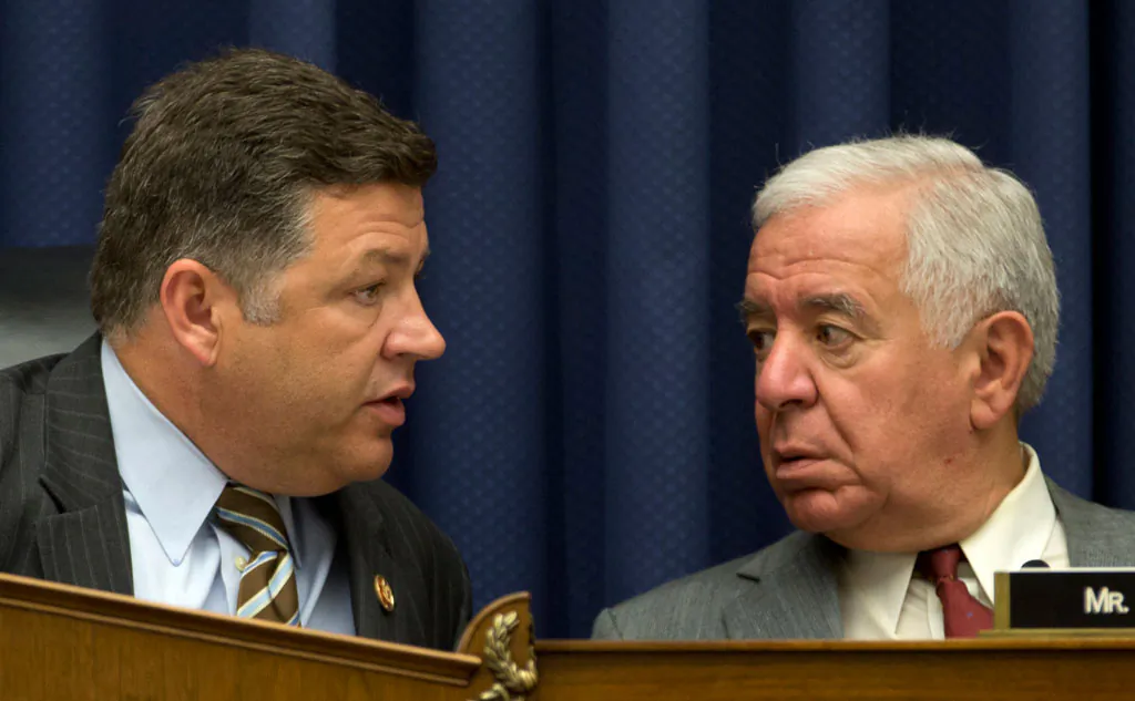 House Transportation and Infrastructure Committee Chairman Rep. Bill Shuster (R-Pa.) (L) talks to then ranking Democrat Rep. Nick Rahall (D-W.Va.) on Capitol Hill in Washington on May 16, 2013. The Obama administration is on the verge of proposing long-awaited rules for commercial drone operations in the U.S. sky, but key decisions on how much access to grant drones are likely to come from Congress next year. (AP Photo/Carolyn Kaster)