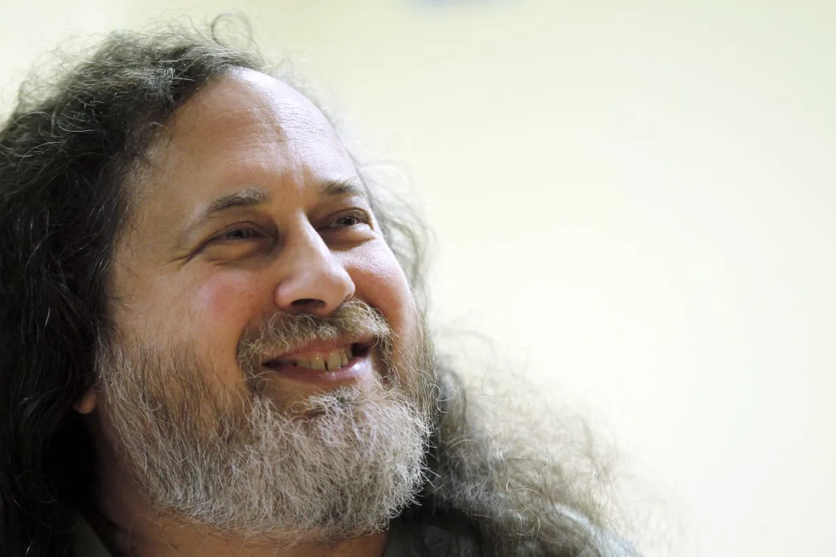 US software freedom activist and computer programmer Richard Stallman speaks with French Green Party 'Europe Ecologie les Verts' (EELV)'s candidate for 2012 French presidential election Eva Joly at the EELV's headquarters in Paris on Dec. 15, 2011. ( Francois Guillot/AFP/Getty Images)