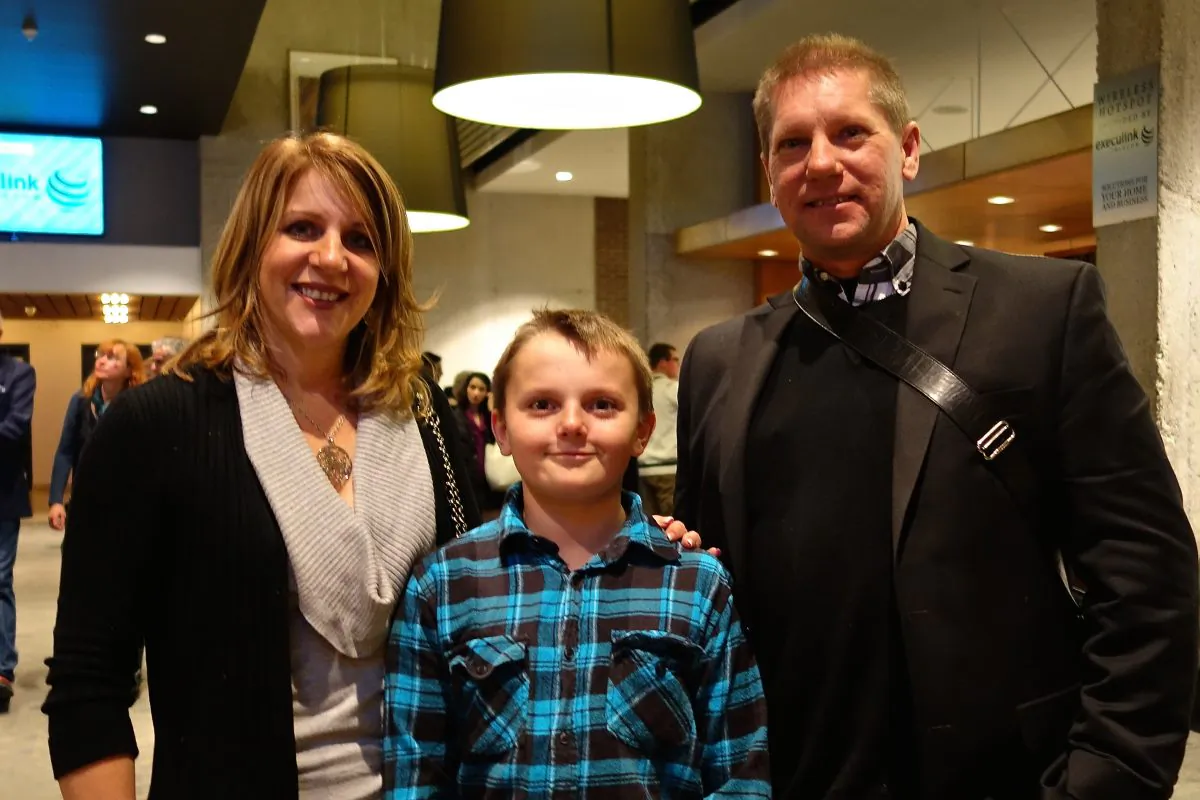 (L-R) Laura Allpress, Gavin Lunau, and Scott Lunau enjoyed Shen Yun Performing Arts at Centre In The Square in Kitchener on Dec. 29, 2014. (Matthew Little/Epoch Times) 