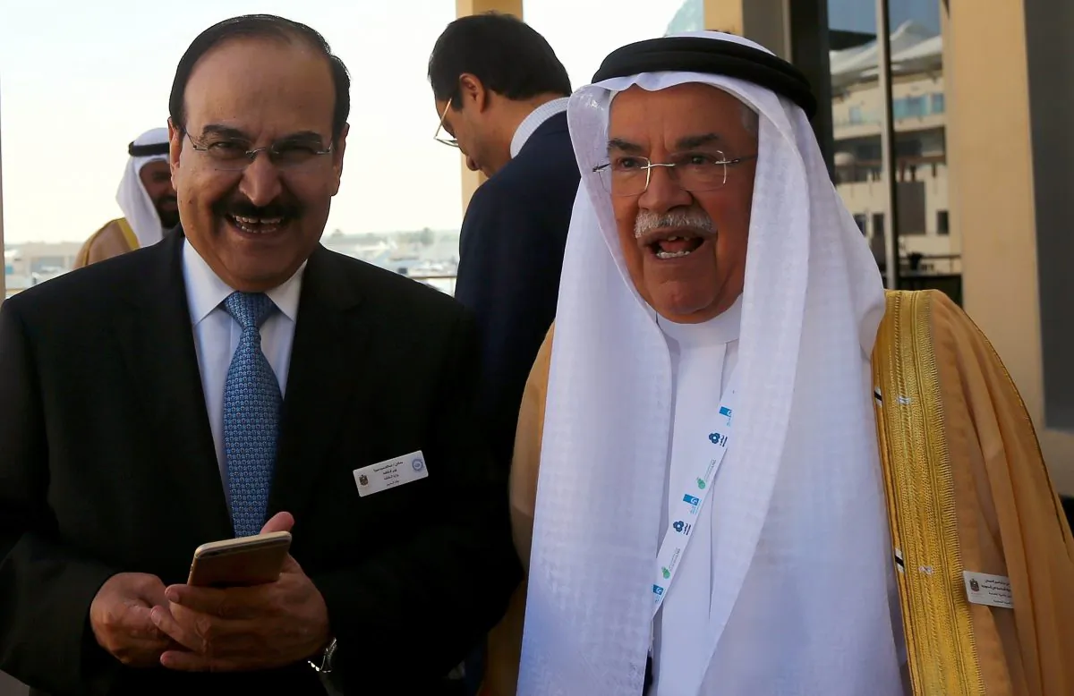 Saudi Oil Minister Ali al-Naimi (R) stands with Bahraini Oil Minister Abdulhussain bin Ali Mirza during the opening session of the 10th Arab Energy Conference in Abu Dhabi on Dec. 21, 2014. (Marwan Naamani/AFP/Getty Images)