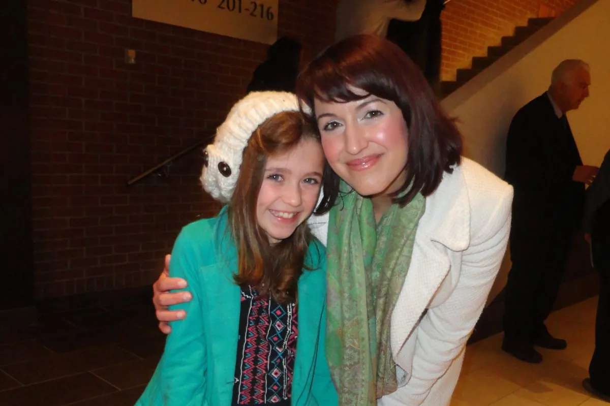 Mezzo-soprano Jennifer Centrone and her daughter, Paris, enjoyed Shen Yun Performing Arts at Centre In The Square in Kitchener, Canada on Dec. 30, 2014. (Madalina Hubert/Epoch Times)