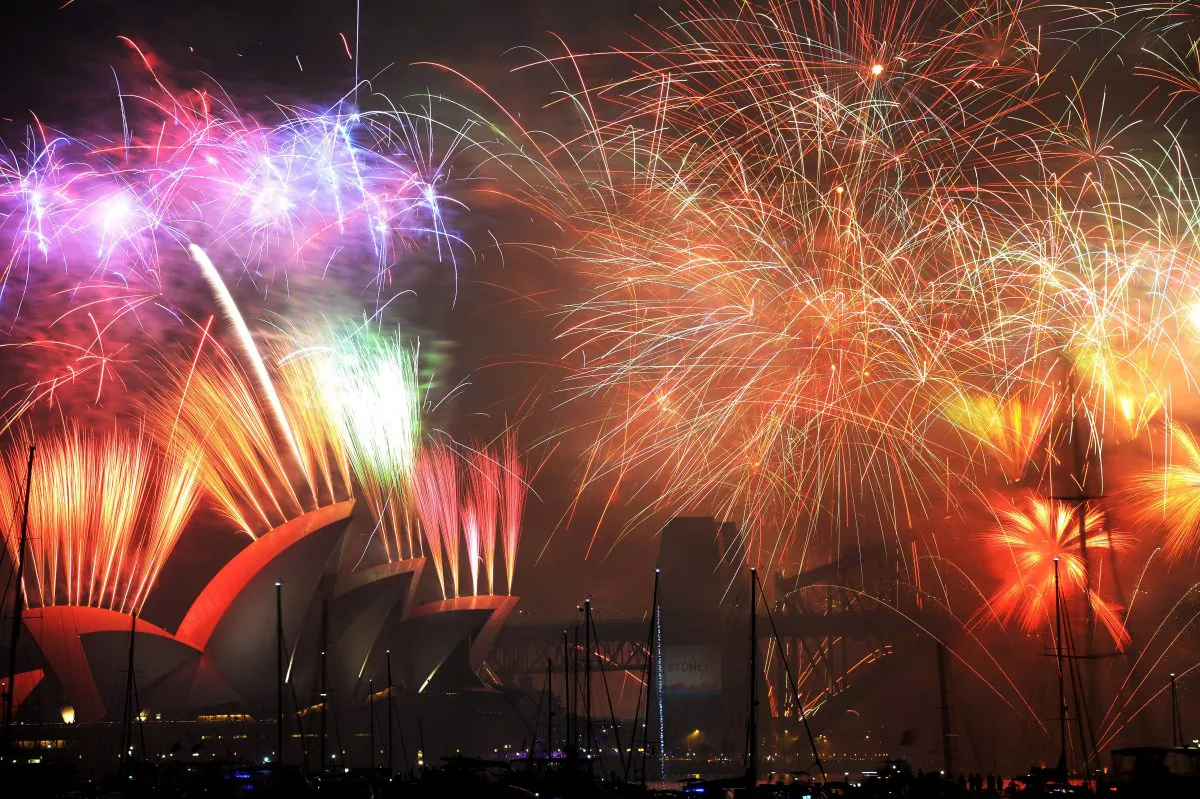 New Year's Eve fireworks erupt over Sydney's iconic Harbour Bridge and Opera House, Australia, during the traditional fireworks show held at midnight on Jan. 1, 2015. (Peter Parks/AFP/Getty Images)