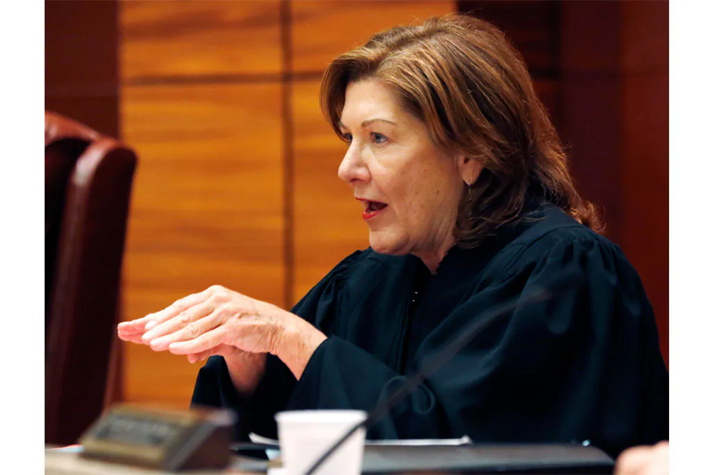 Presiding Justice Karen Peters of the New York Supreme Court Appellate Division Third Department in Albany, N.Y., on Wednesday, Oct. 8, 2014. Parks is one of five Justices who unanimously ruled to uphold an outdoor smoking ban at New York parks. (AP Photo/Mike Groll)