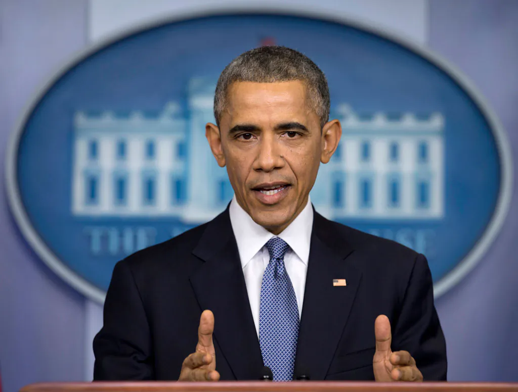 President Barack Obama speaks during a news conference in the Brady Press Briefing Room of the White House in Washington on Dec. 19, 2014. In the White House, President Barack Obama has preached economic opportunity and equal access to education as cornerstones of the legacy he says he wants to leave behind. But in the contest to host his presidential library, two public universities that serve needy communities fear the playing field has been tilted against them by a pair of elite, private schools with seemingly endless funding. (AP Photo/Carolyn Kaster)