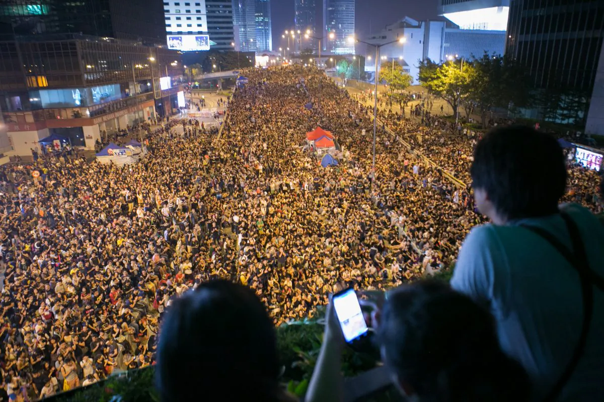 Tens of thousands of people gather near the Chinese People's Liberation Army Forces Building, demanding democracy in Hong Kong on Oct. 4, 2014. (Benjamin Chasteen/Epoch Times)