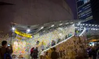 ‘Don’t Give Up,’ Chalk Flower Girl Tells HK Umbrella Protesters