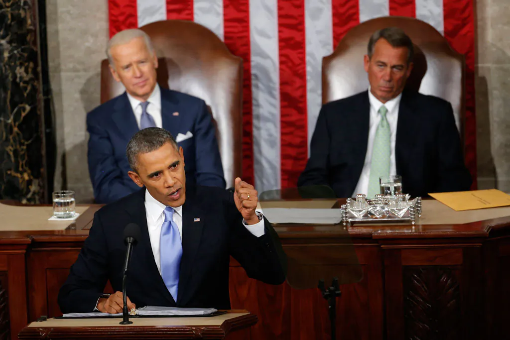 Vice President Joe Biden and House Speaker John Boehner of Ohio listens as President Barack Obama gives his State of the Union address on Capitol Hill in Washington on Jan. 28, 2014. Away for more than half a month, President Barack Obama returns to the White House this weekend aiming to set the agenda for the new year solely on his terms. He’ll face newly emboldened Republicans who feel their victory in last year’s midterm elections give them a mandate to rein the president in. (AP Photo/Charles Dharapak)
