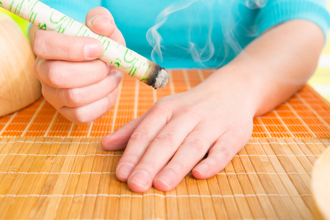 Moxibustion is an effective treatment for pain and many other health problems. (Shutterstock)