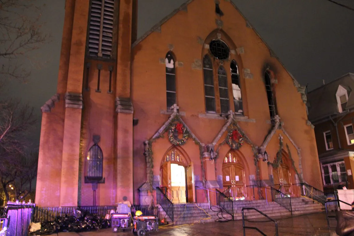 Our Lady of Sorrows Catholic Church after a heavy fire in Corona, Queens, N.Y. on Jan. 4, 2015. (Shannon Liao/Epoch Times)