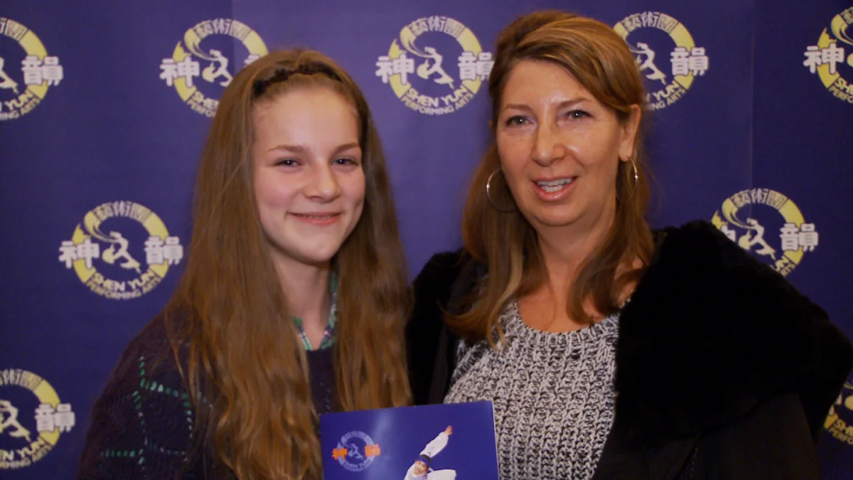Carol McLeod (L) and her granddaughter Madison McDonald admired the skill of the dancers in the Shen Yun Performing Arts production at the national Arts Centre in Ottawa on Jan. 4, 2014. (NTD Television)

