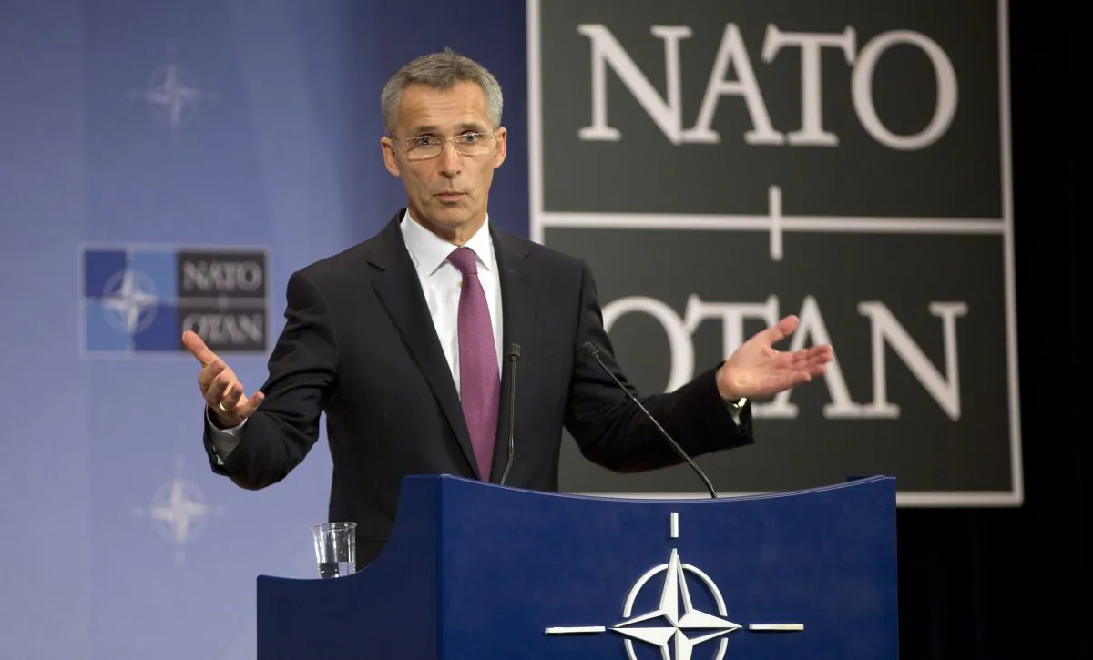 NATO Secretary-General Jens Stoltenberg at a media conference prior to a meeting of the North Atlantic Council at NATO headquarters in Brussels on Dec. 2, 2014. (AP Photo/Virginia Mayo)