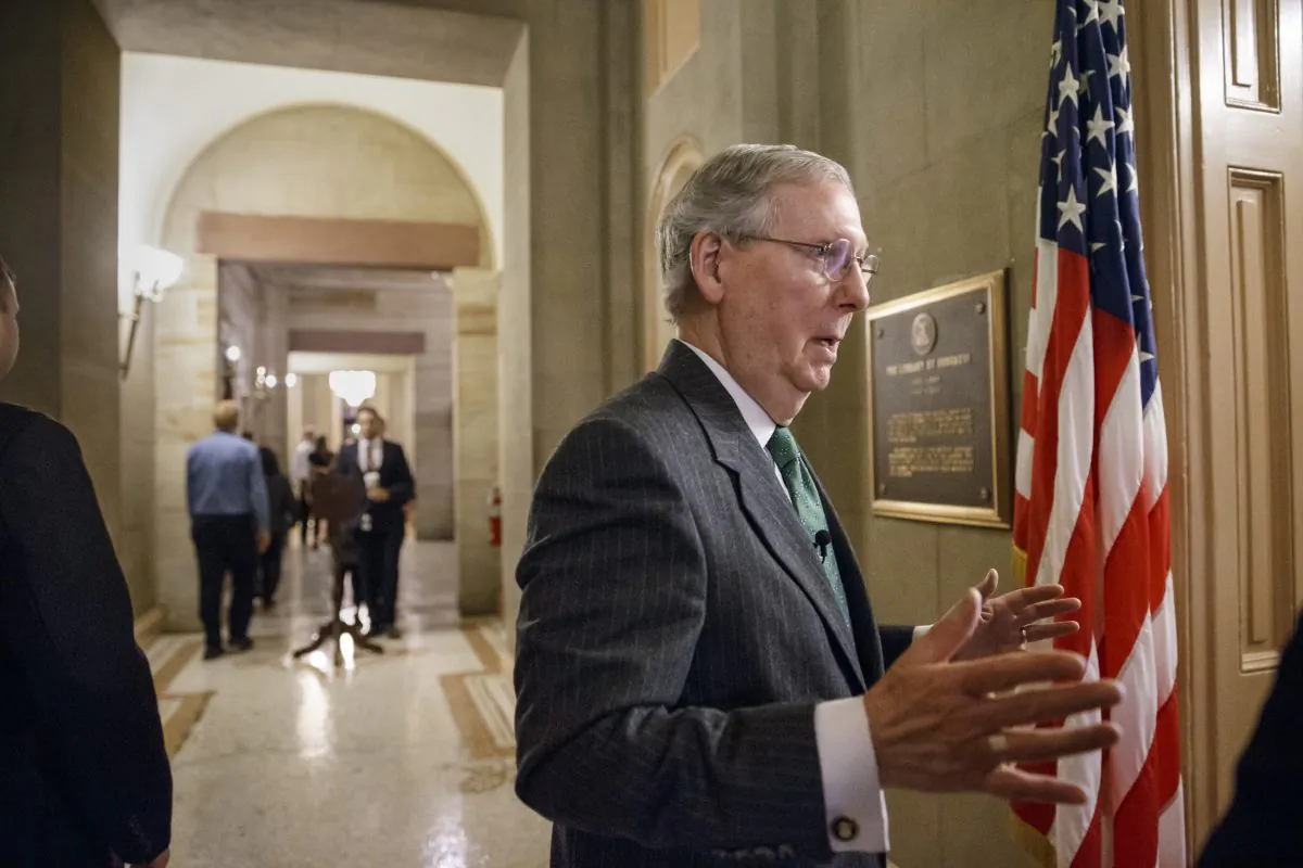 Incoming Senate Majority Leader Mitch McConnell of Ky. pauses outside his office on Capitol Hill in Washington, Monday, Jan. 5, 2015, as he prepares for Tuesday's opening of the 114th Congress under GOP control. (AP Photo/J. Scott Applewhite)