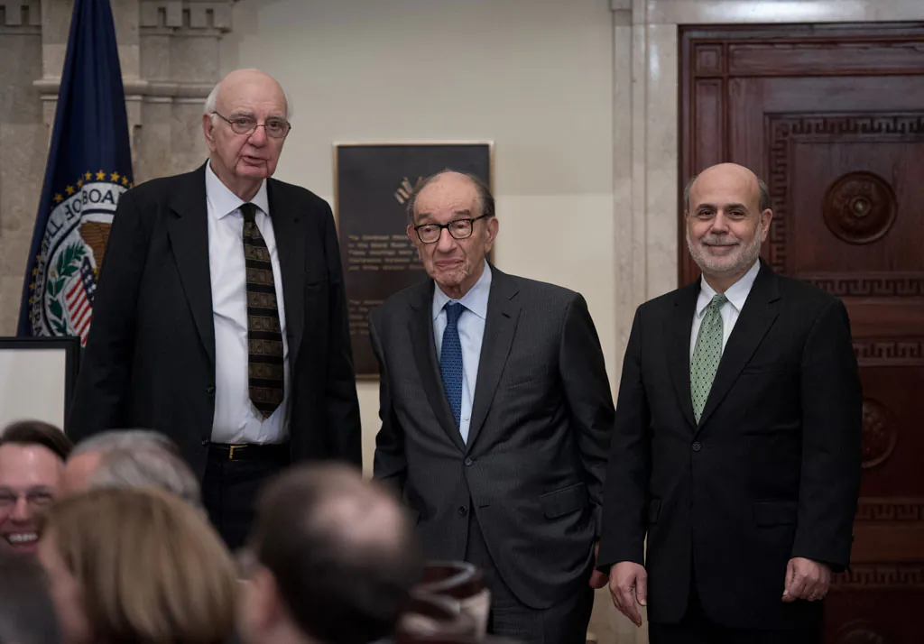 US Federal Reserve chairman Ben Bernanke (R) and former chairmen Alan Greenspan (C) and Paul Volcker pose during a ceremony marking the centennial of the founding of the Federal Reserve in Washington on Dec. 16, 2013. (Nicholas Kamm/AFP/Getty Images)