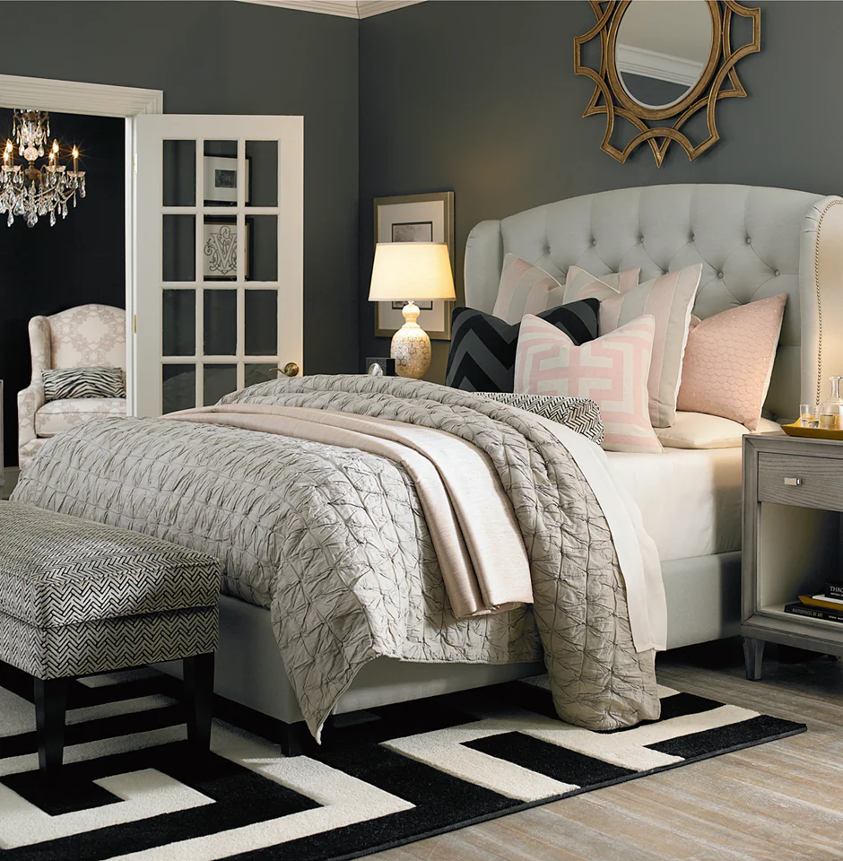 A tufted headboard makes a stunning focal point and adds an element of sophistication and elegance to a guest bedroom. (Courtesy of Bassett Furniture)