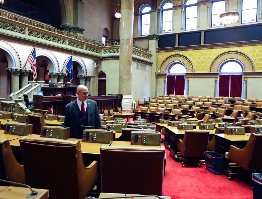 Assemblyman Dean Murray R-East Patchogue, in the Assembly Chamber at the state Capitol in Albany, N.Y., on Tuesday, Jan. 6, 2015. Murray won back his old Assembly seat and expected to be sworn in on Wednesday, Jan. 7, 2015. (AP Photo/Mike Groll)