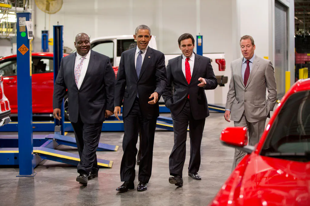 (L-R) Ford plans manager, Phillip Calhoun, President Barack Obama, Ford President and CEO Mark Fields and Bill Ford eye a new Mustang at Ford Michigan Assembly Plant, Wednesday, Jan. 7, 2015, in Wayne, Mich., where the president spoke about the resurgent American automotive and manufacturing sector. (AP Photo/Carolyn Kaster)
