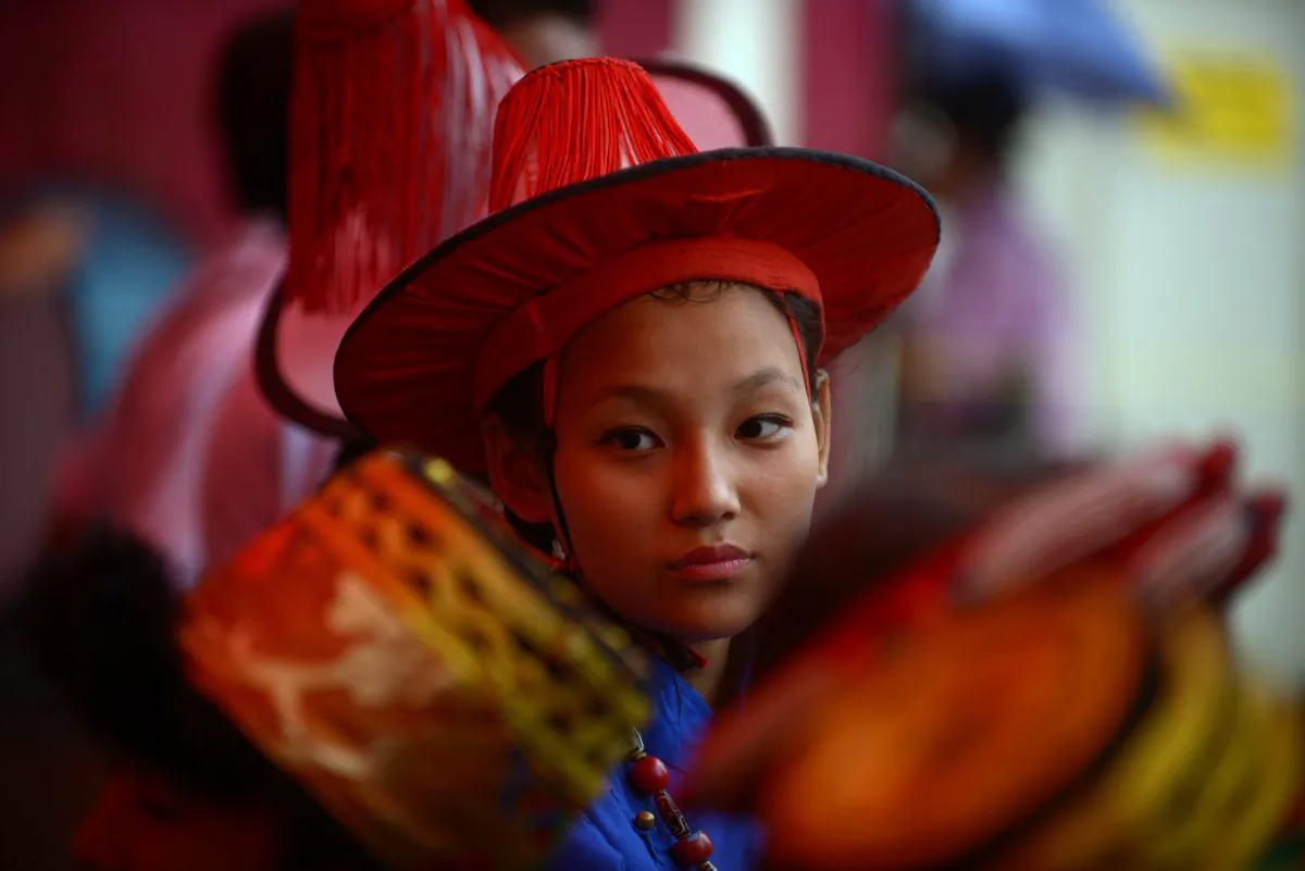 Exiled Tibetans at an event honoring the 78th birthday of the Dalai Lama, at Manag monastry in Kathmandu, India, on July 6, 2013. (Prakash Mathema/AFP/Getty Images)