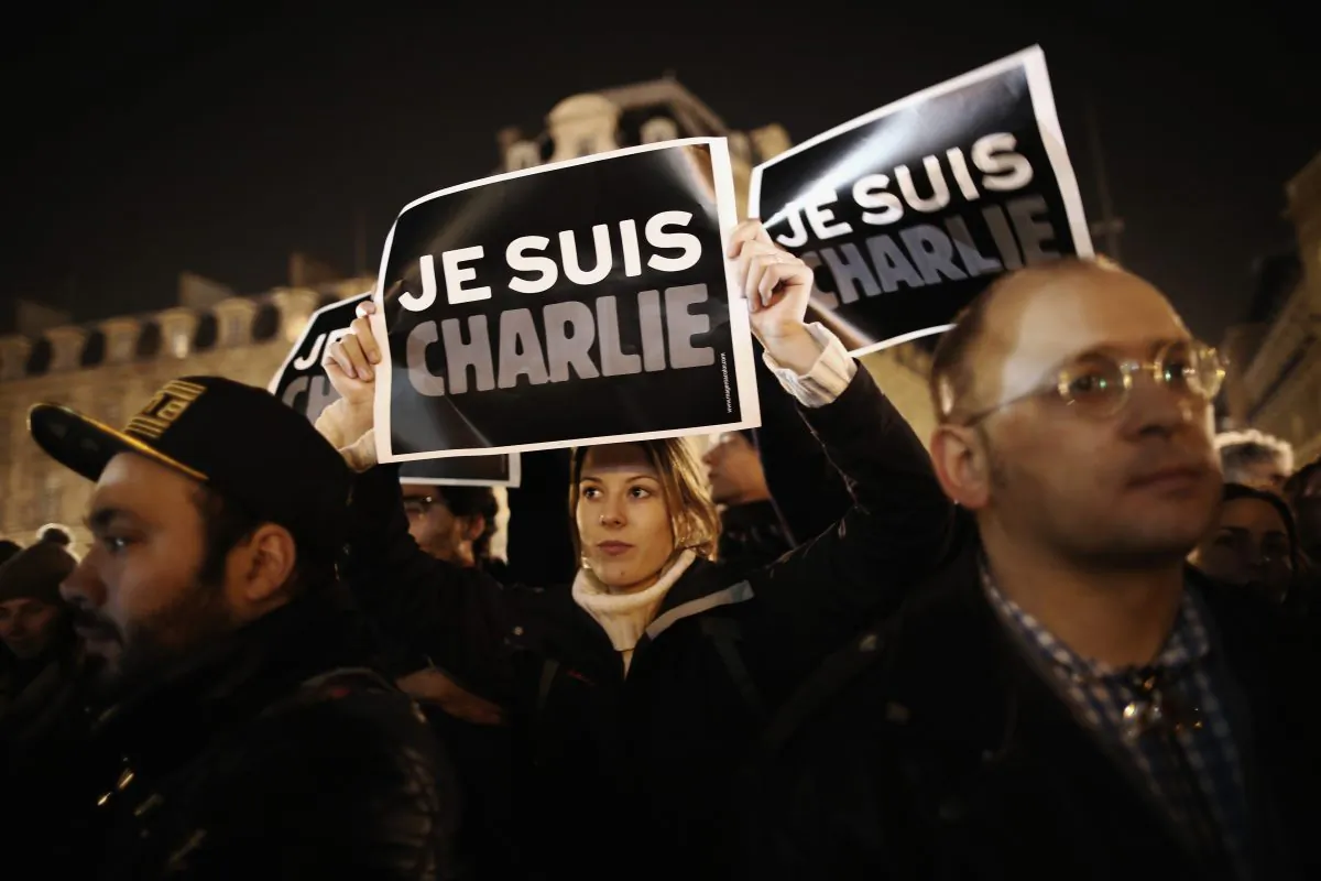  People hold a vigil at the Place de la Republique (Republic Square) for victims of yesterday's terrorist attack, on January 8, 2015  in Paris, France. (Dan Kitwood/Getty Images)