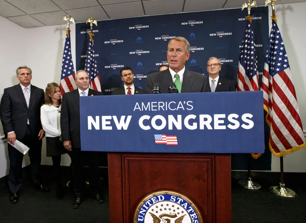 House Speaker John Boehner of Ohio speaks to reporters following a House GOP caucus meeting on Capitol Hill in Washington, Wednesday, Jan. 7, 2015. (L-R) House Majority Leader Kevin McCarthy of Calif., Rep. Lynn Jenkins, R-Kansas, House Majority Whip Steve Scalise of La., Rep. Todd Young, R-Ind., Boehner, and Rep. Kevin Cramer, R-N.D. Boehner said his had a "family conversation" about how to respond to the 25 conservatives who revolted and voted against him on the floor for his re-election as speaker on Tuesday. Two GOP conservatives were kicked off the Rules Committee earlier, Rep. Daniel Webster, R-Fla., who challenged Boehner for speaker, and Rep. Rich Nugent, R-Fla., who voted for Webster. (AP Photo/J. Scott Applewhite)