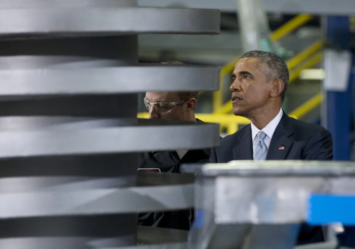 President Barack Obama tours Techmer PM, a plastic fabrication company, Friday, Jan. 9, 2015, in Clinton, Tenn. Obama will spend most of the week ahead focusing on identity theft, electronic privacy and other cyberspace issues. The events are part of Obama's strategy of providing sneak peeks of the proposals he'll outline in his upcoming State of the Union address. (AP Photo/Carolyn Kaster)
