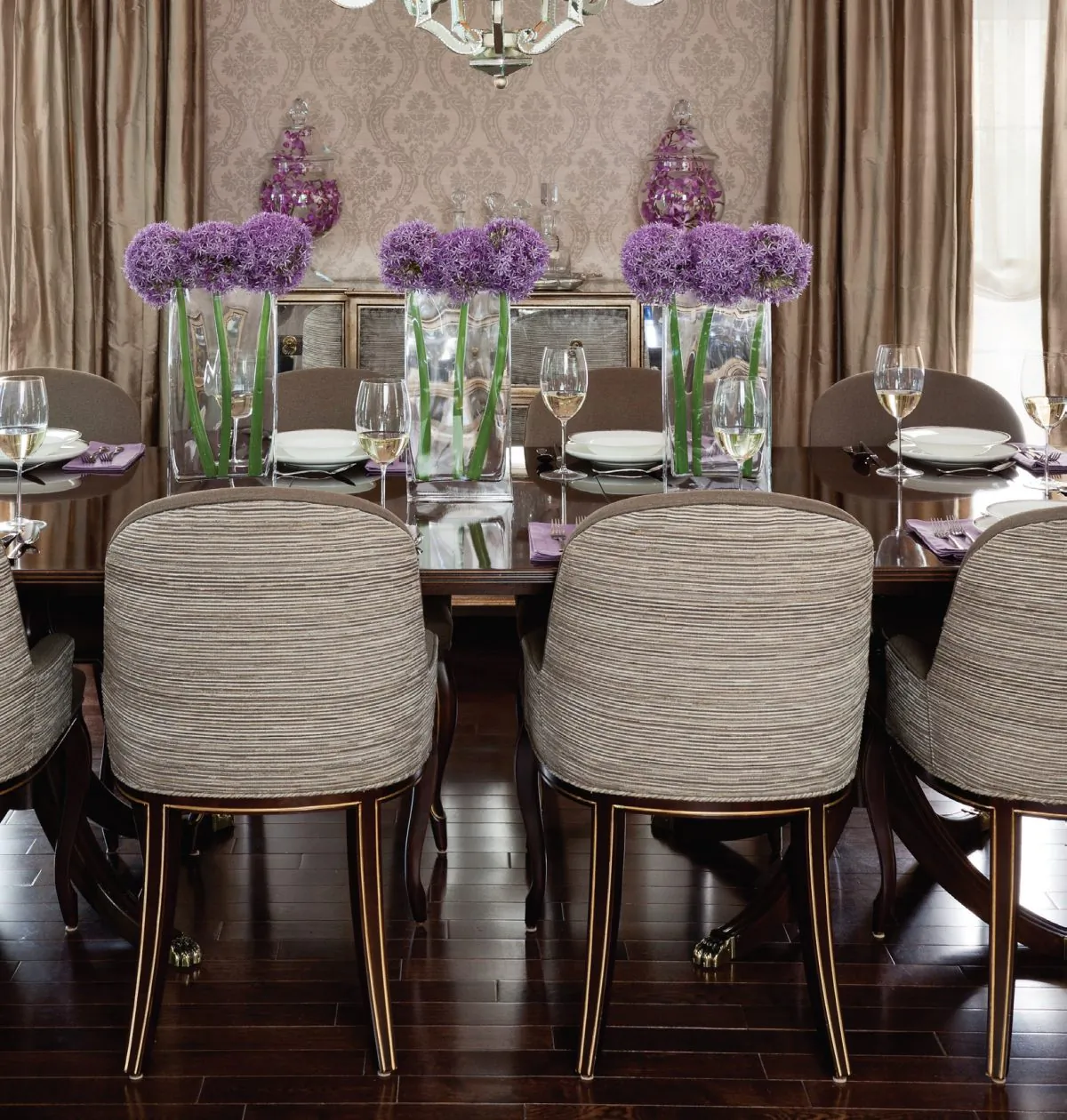 The dining room is neutral, with pops of colour brought in with floral arrangements and dishes. (Donna Griffith)