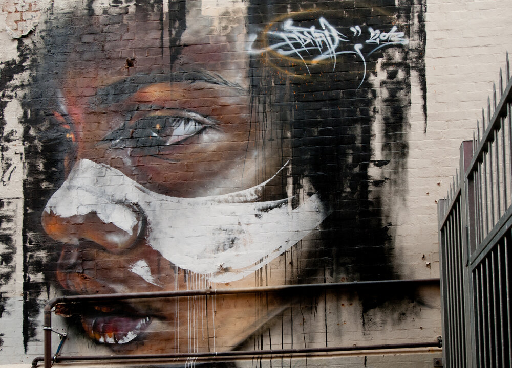 Street art depicting an Aborigine by an unidentified artist in Adelaide, Australia, seen April 26, 2014. (Shutterstock*)