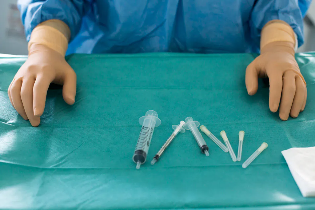 A nurse prepares specific medication at the Argenteuil hospital in the suburbs of Paris on July 22, 2013. (Fred Dufour/AFP/Getty Images)