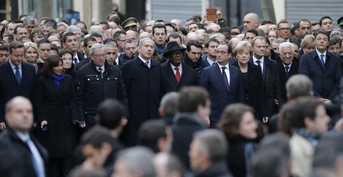 Front row from left, British Prime Minister David Cameron, Paris Mayor Anne Hidalgo, President of the European Commission Jean-Claude Juncker, Israeli Prime Minister Benjamin Netanyahu, Malian President Ibrahim Boubacar Keita, French President Francois Hollande, German Chancellor Angela Merkel, Polish Prime Minister Donald Tusk, Palestinian Authority President Mahmoud Abbas, Italian Prime Minister Matteo Renzi, and other dignitaries, heads of government and heads of state march during a rally in Paris, Sunday, Jan. 11, 2015. More than 40 world leaders, their arms linked, marched through Paris Sunday to rally for unity and freedom of expression and to honor 17 victims of three days of terrorist attacks. (AP Photo/Christophe Ena)