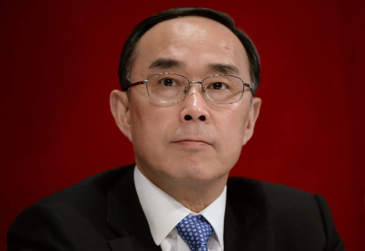 Chairman and CEO of China Unicom Chang Xiaobing speaks during a press conference in Hong Kong on Aug. 8, 2013. The company is alleged to be able to spy on its users, according to a Chinese security website. (Dale de la Rey/AFP/Getty Images)