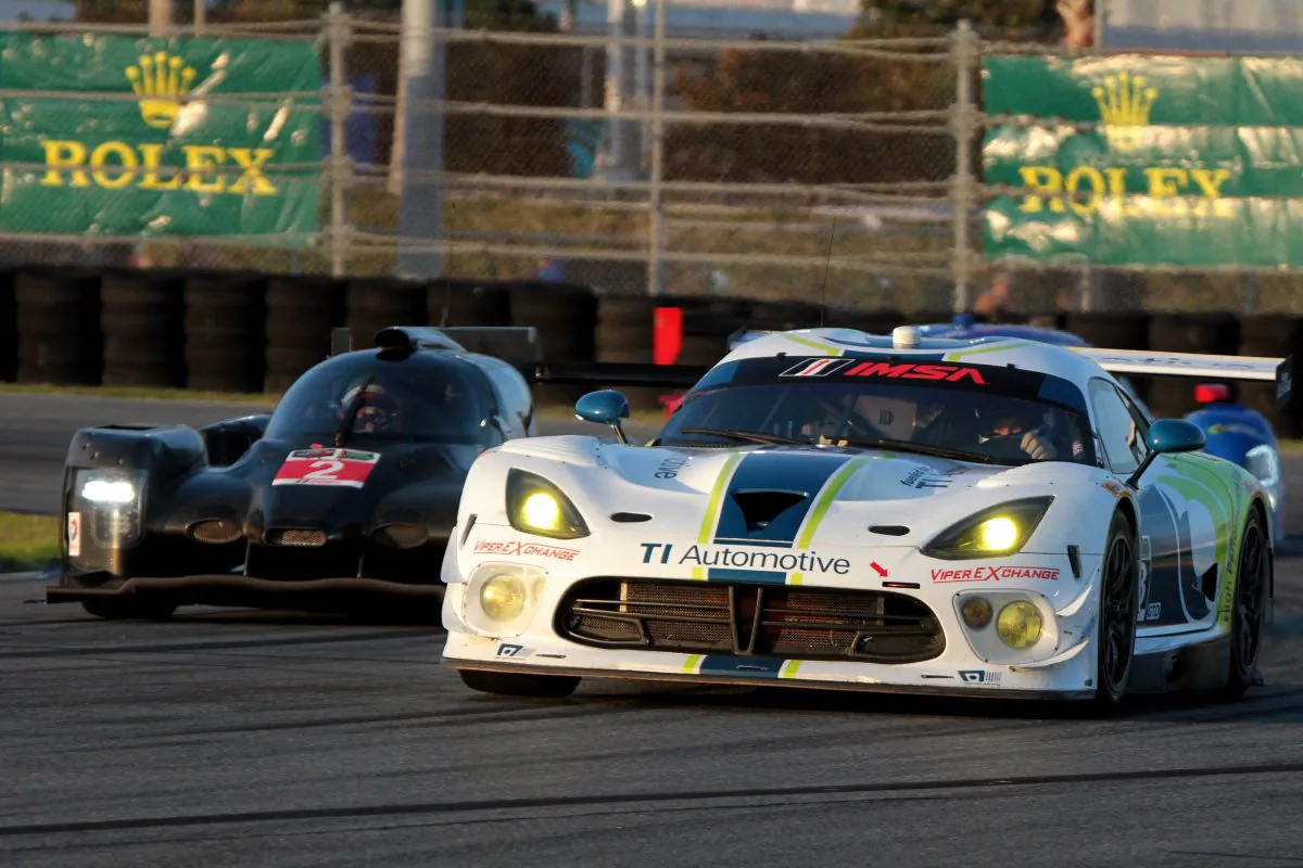The #93 Riley Motorsports Viper leads the #2 Extreme Speed Motorsports HPD ARX-04a around the East Horseshoe during the IMSA TUSC Roar Before the 24, Jan. 10, 2015. These cars, and more than 50 others like them, will be racing in the Rolex 24 Jan. 24–25. (Chris Jasurek/Epoch Timers)