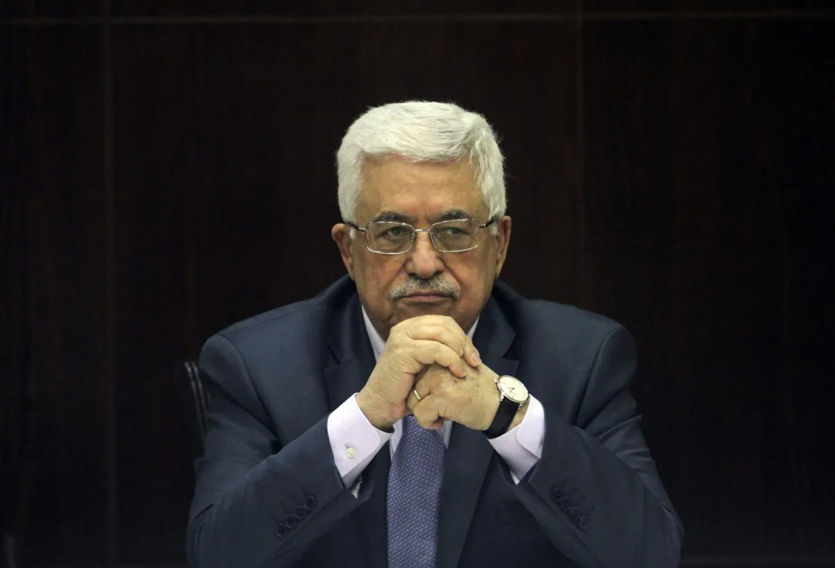 Palestinian President Mahmoud Abbas chair a session of the Palestinian cabinet in the West Bank city of Ramallah on July 28, 2013. (AP Photo/ Xinhua, Issam Rimawi)