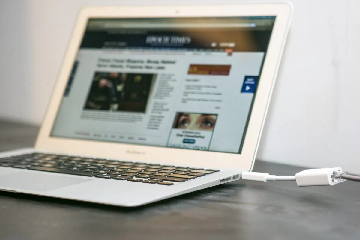 A computer with a thunderbolt port connected to it in New York on Jan. 13, 2015. Thunderbolt ports can be a source of malware infection. (Benjamin Chasteen/Epoch Times)