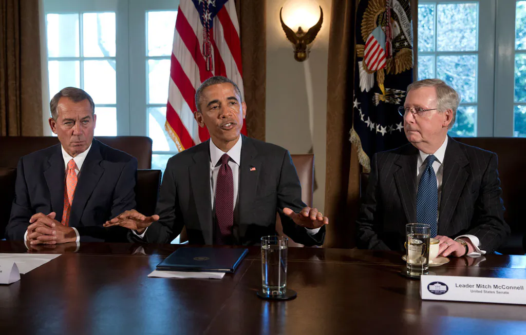 President Barack Obama (C), joined by House Speaker John Boehner of Ohio (L), and Senate Majority Leader Mitch McConnell of Ky. (R), speaks to media before his meeting with bipartisan, bicameral leadership of Congress to discuss a wide range of issues, Tuesday, Jan. 13, 2015, in the Cabinet Room of the White House in Washington. (AP Photo/Carolyn Kaster)