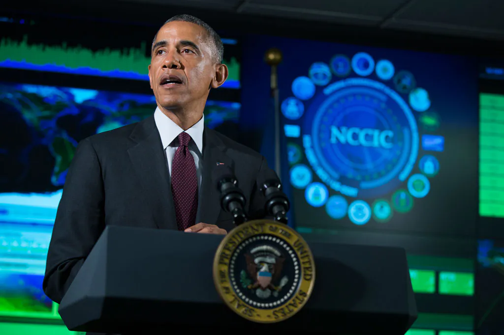 President Barack Obama speaks at the National Cybersecurity and Communications Integration Center in Arlington, Va., on Tuesday, Jan. 13, 2015. Obama renewed his call for Congress to pass cybersecurity legislation, including a proposal that encourages companies to share threat information with the government and protects them from potential lawsuits if they do. (AP Photo/Evan Vucci)