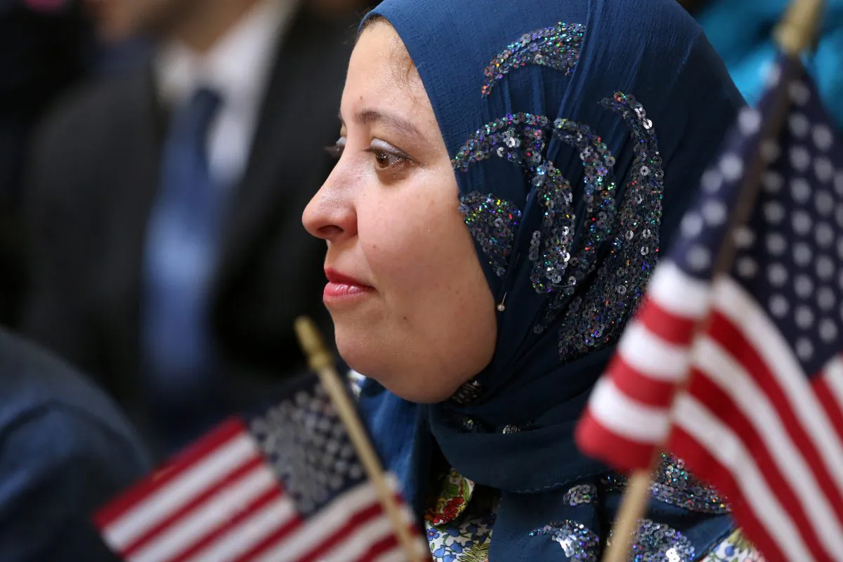 Puja Nanda from India takes part in a naturalization ceremony to become an American citizen at Federal Hall in New York on March 22, 2013. (John Moore/Getty Images)