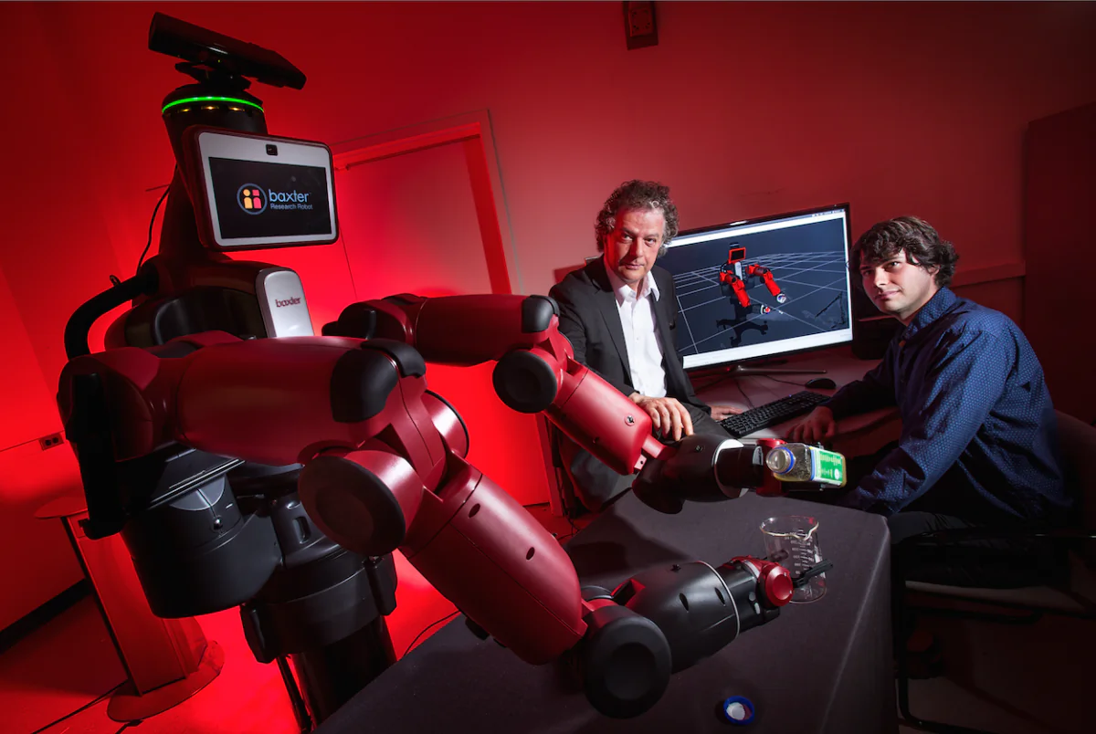 University of Maryland computer scientist Yiannis Aloimonos (center) is developing robotic systems able to visually recognize objects and generate new behavior based on those observations. (John T. Consoli/University of Maryland)