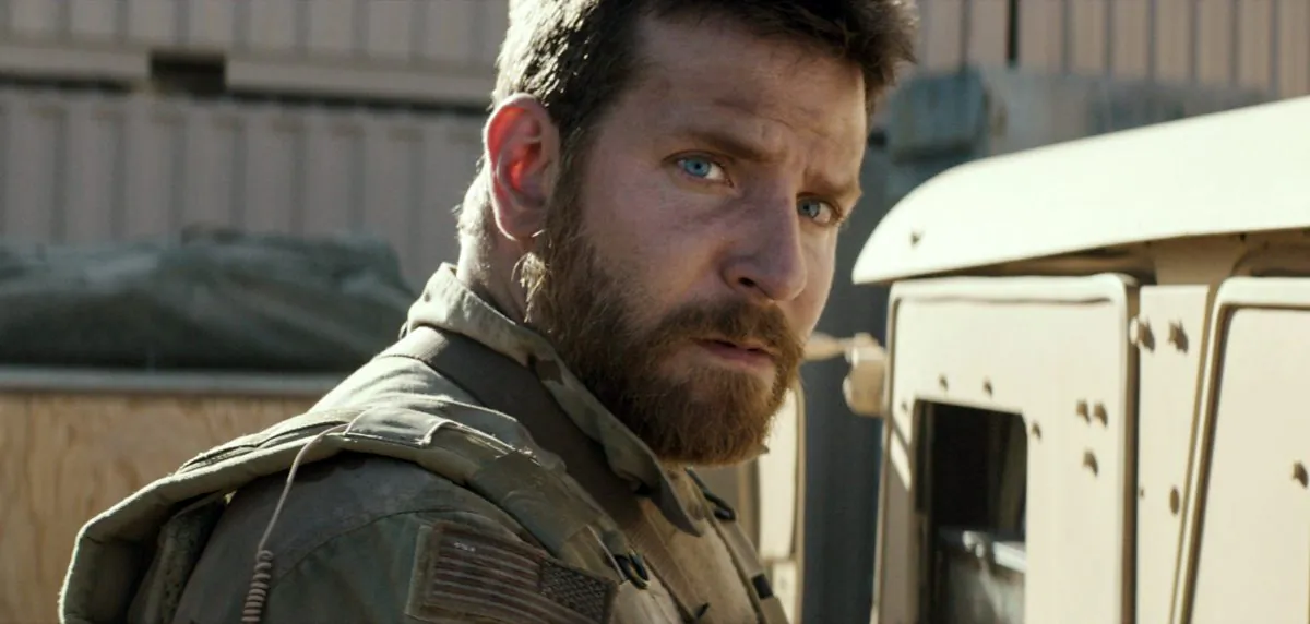Bradley Cooper playing the role of Chis Kyle in  "American Sniper." The film grabbed $64 million at the box office this weekend for a total of $200 million domestic at the box office. (AP Photo/Warner Bros. Pictures)